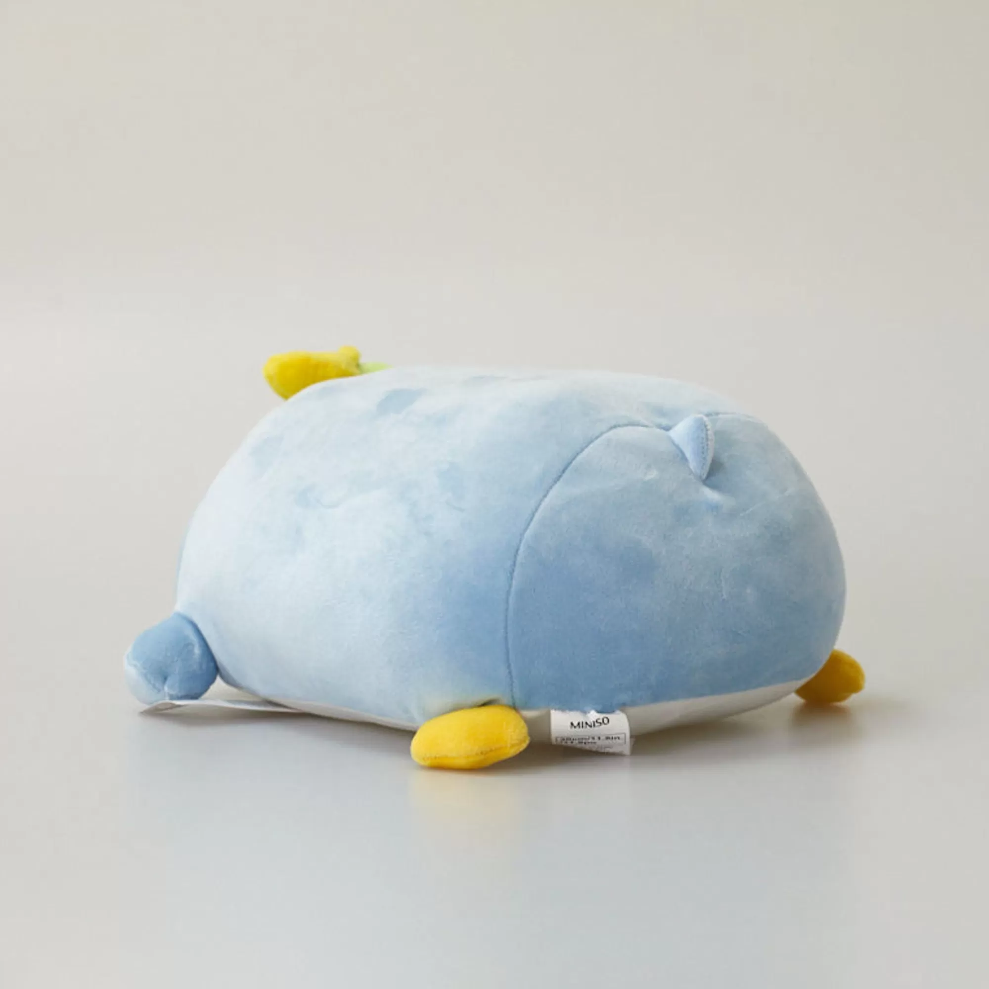 MINISO Peluches-Pinguino Azzurro Banana