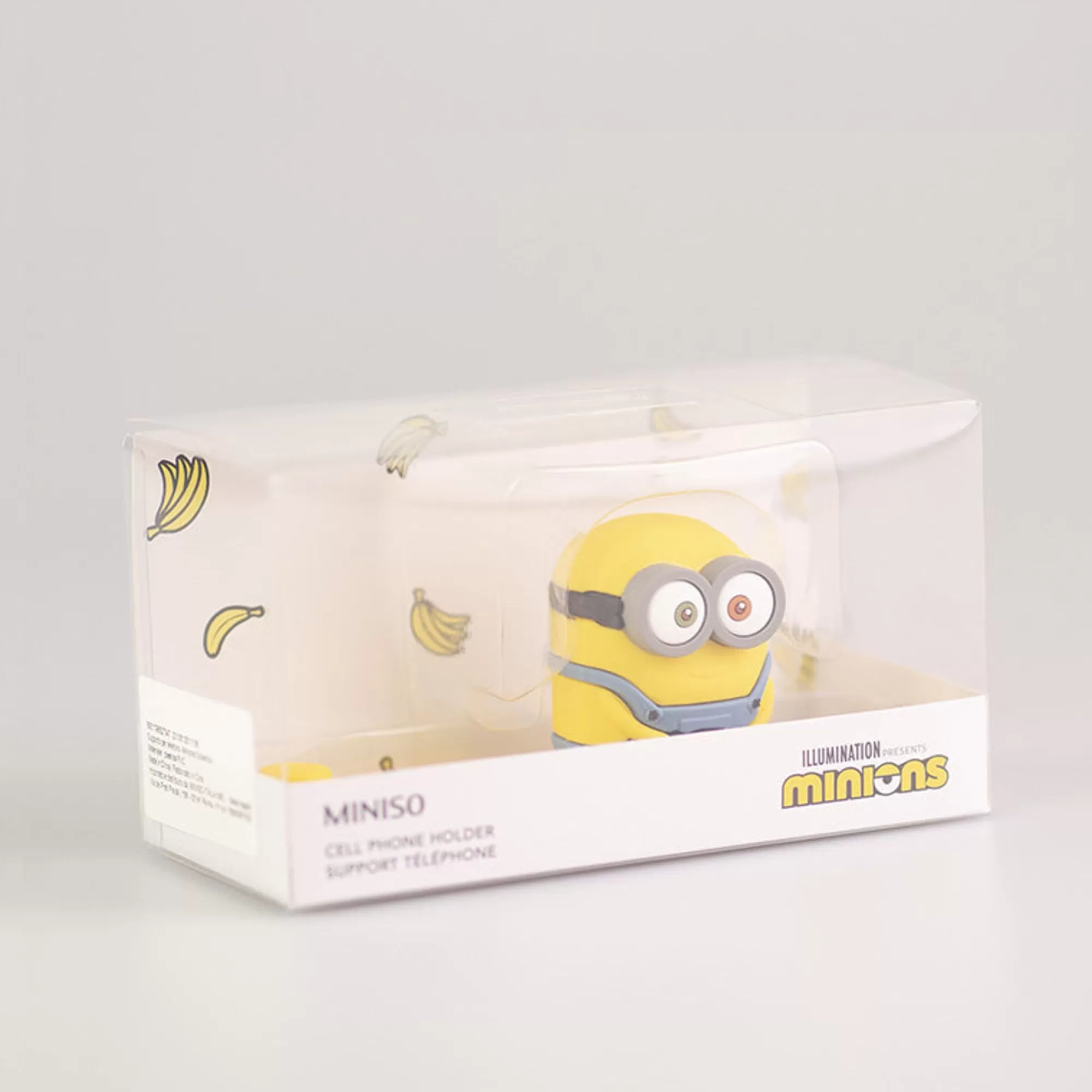 MINISO Accessori Digital-Poggia Cellulare Minions - Seduto